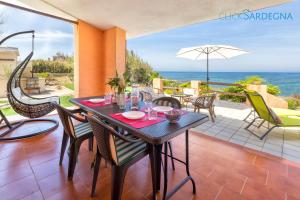 Villa seashore of the Marina of Sorso, 3 rooms, veranda on the sea, garden