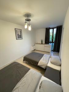 Appartements Grand appartement Annemasse : photos des chambres