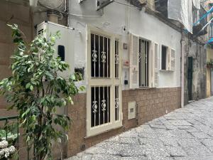 Vittorias home near Maradona mural