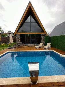 ROSE SAPANCA STONE HOUSE