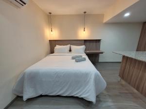 Apartaestudio 21 Detrás del Hyper Jumbo con planta eléctrica