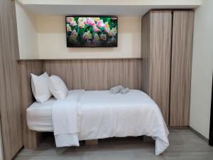 Apartaestudio 21 Detrás del Hyper Jumbo con planta eléctrica