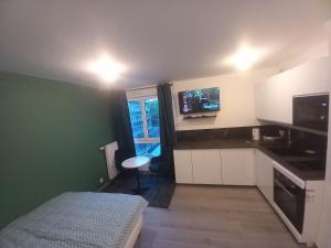 Appartements Le Cocon Vert : photos des chambres