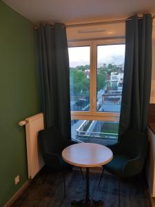 Appartements Le Cocon Vert : photos des chambres