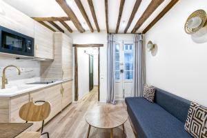 Appartements Apartment Victoires - Palais Royal by B'Your Home : photos des chambres