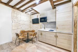 Appartements Apartment Victoires - Palais Royal by B'Your Home : photos des chambres