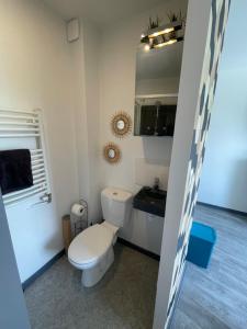 Appartements Studio petit plus gaming ! : photos des chambres