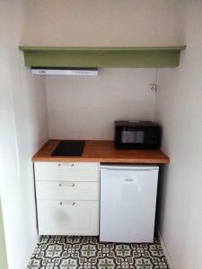 Appartements Appartement avec balcon / jardin : photos des chambres