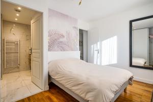 Appartements The Golden white, Luxury T3 : photos des chambres