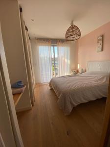 Villas Maison cosy proche parade et 24h- 7 pers - garage- jardin-wifi- Vue cathedrale : photos des chambres