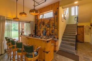 StayVista at Peacocks & Partridges with Amidst Greenery, Terrace, Indoor Fireplace, Bar & Snooker Table