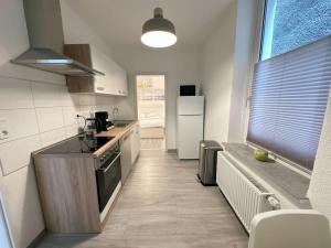 Möblierte Erdgeschoss-Wohnung mit Parkplatz in bester Lage des Stadtzentrums Herne, WLAN, Netflix- Super Autobahn-und ÖPNV-Anbindung