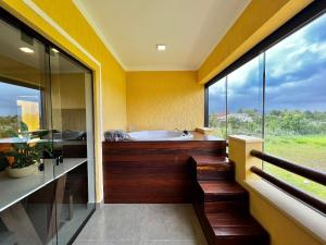 Relaxe na Jacuzzi c sais de banho á 300m da Praia