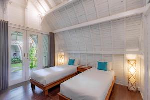 Phòng Hai Giường Đơn Loại Sang (Deluxe Twin Room)