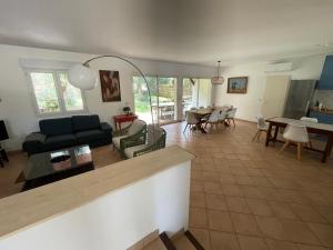 Villas Ref 147 Seignosse Golf , Villa classee 3 etoiles avec Wifi , 10 personnes, jardin boise, a 5kms des plages : photos des chambres