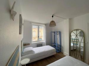 Appartements Suites Carnot, Venise Normande. : photos des chambres