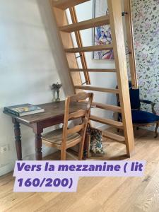 Appartements Gite Chambre de la Tante Camille - Les Filles Tresy : photos des chambres