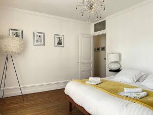 Appartements Le Trouvill'Art - YourHostHelper : photos des chambres