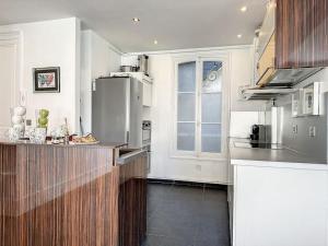 Appartements Le Trouvill'Art - YourHostHelper : photos des chambres