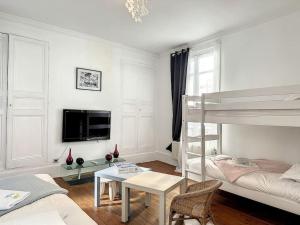 Appartements Le Trouvill'Art - YourHostHelper : photos des chambres