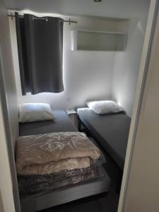 Campings Charmant mobil-home cosy 98 : photos des chambres