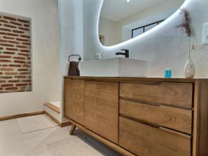 Appartements Le Jardin Secret - Piscine - Clim - Haut de gamme : photos des chambres