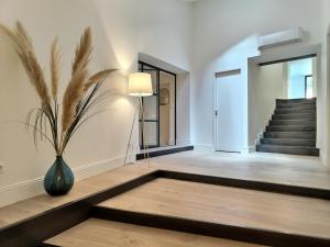 Appartements Le Jardin Secret - Piscine - Clim - Haut de gamme : photos des chambres