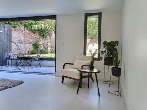 Appartements Le Jardin Secret - Piscine - Clim - Haut de gamme : photos des chambres