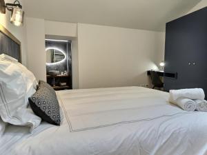 Appartements Le Jardin Secret - Piscine - Clim - Haut de gamme : photos des chambres