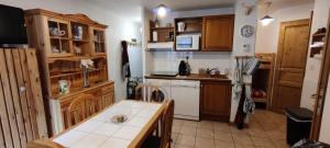 Appartements Coquet F2 La Giettaz avec garage velos/motos : photos des chambres