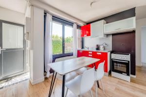 Appartements Maison de plain pied avec jardin : photos des chambres