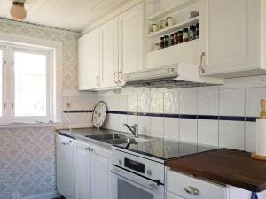 4 person holiday home in GRUNDSUND