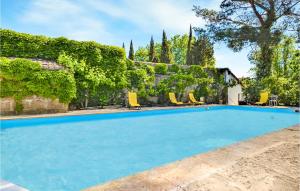 Maisons de vacances Awesome Home In Sernhac With Outdoor Swimming Pool, Wifi And 3 Bedrooms : photos des chambres