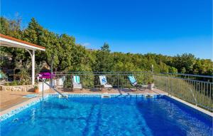 Stunning Home In Jablanac With 4 Bedrooms, Wifi And Outdoor Swimming Pool