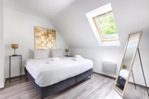 Maisons de vacances Square-bnb - La Maison Pasteque a 8min de Disney : photos des chambres