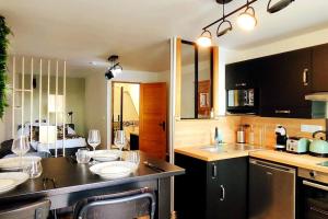 Appartements My Conciergerie by LV- Studio le St O-Zone : photos des chambres