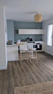 Appartements au Coeur de Maine : photos des chambres