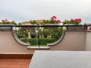 Villa I Giardini del Conero con ombrellone in spiaggia
