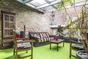 Appartements Appartement avec jardin interieur 4 pers centre ville : photos des chambres
