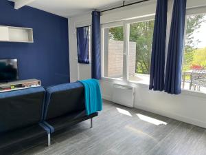 Appartements Blue & Red & Green - Louez L'Esprit Libre! : photos des chambres