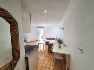 Appartement C dans une villa avec piscine chauffée & jacuzzi, chauffe en extra