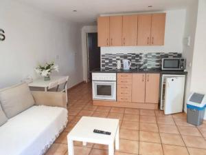 Appartement C dans une villa avec piscine chauffée & jacuzzi, chauffe en extra