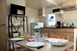 Campings Mobilhome «Chanson d'ete» : photos des chambres