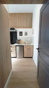 Appartements Le Raffine : photos des chambres