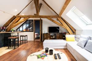 Appartements SOUS LE HAUT DES REMPARTS : photos des chambres