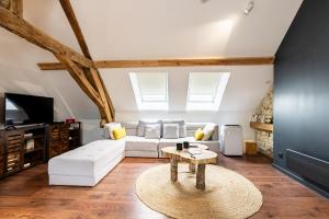 Appartements SOUS LE HAUT DES REMPARTS : photos des chambres