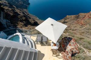 Cliff Suite with Sea View and both Indoor & Outdoor Jetted Plunge Pools room in Iconic Santorini a Boutique Cave Hotel