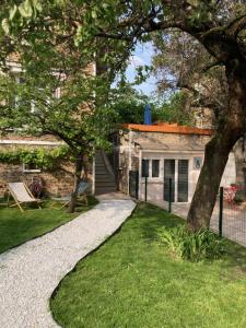 Appartements SUITE AVEC TERRASSE ET JARDIN AUX PORTES DE PARIS : photos des chambres