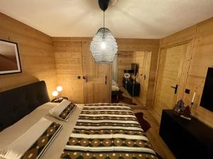 Appartements Megeve -WHITE ASTER- charming renovated apartment : photos des chambres