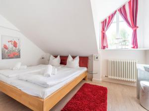 Dünenpark Binz - Komfortplus Ferienwohnung mit 1 Schlafzimmer und Balkon im Dachgeschoss 060